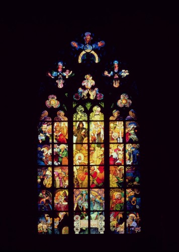 A central panel surrounded by 36 panels seen from the interior of the cathedral
