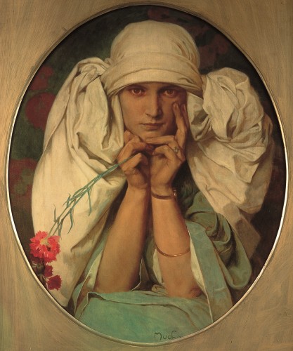Girl in a white headdress resting her head in her hands