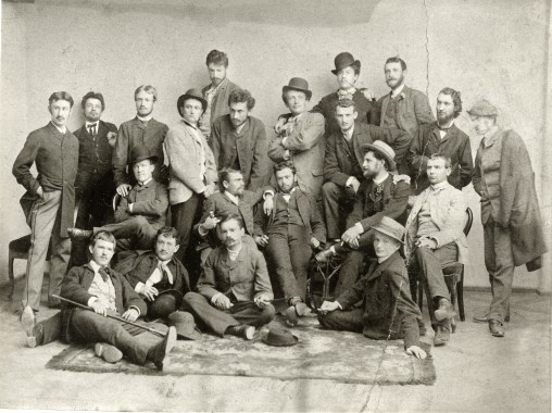 black and white photograph of 21 students standing or seated in an informal manner