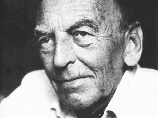 Jiří Mucha Head and shoulders portrait of Jiří Mucha against a black background
