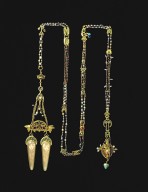 Ornate chain encrusted with pearls and semi-precious stones with a double pendant with two representations of female heads with swirling hair on elongated ivory panels