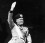 Mussolini saluting Mussolini in uniform raising his right arm in salute