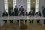 Signing the Agreement to eliminate the USSR and establish the Commonwealth of Independent States 6 men in suits sit at a table next to their national flags and sign an agreement